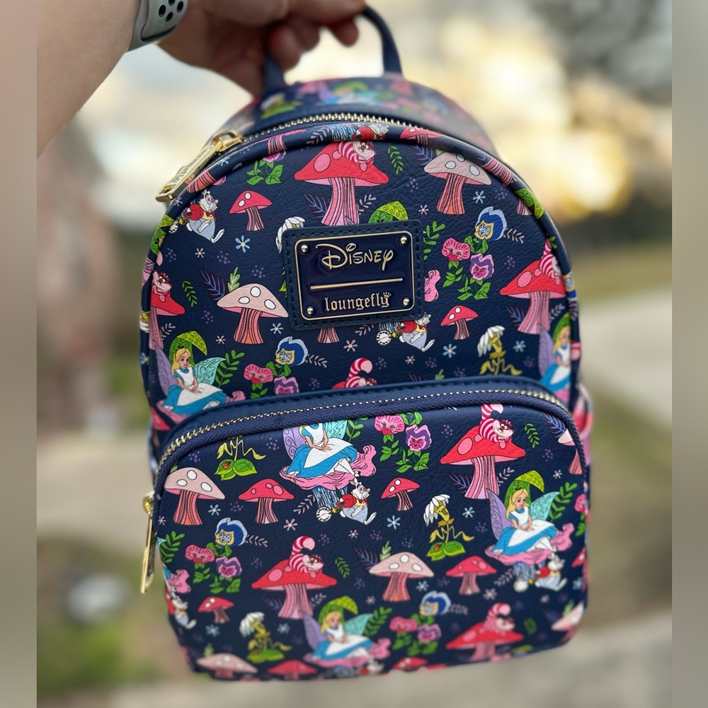 Loungefly Alice in Wonderland AOP Exclusive mini backpack.